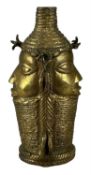TRIBAL ART: TWO BENIN GILT BRONZE VESSELS, each with twin faces, 23cms (h) Provenance: private