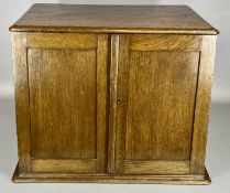 EDWARDIAN OAK TABLETOP CABINET, recessed brass side and drawer handles, double doors opening to