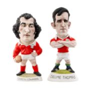 RUGBY UNION CLUB HOUSE: THE WORLD OF GROGGS Gareth Edwards holding a rugby ball, signed by Richard