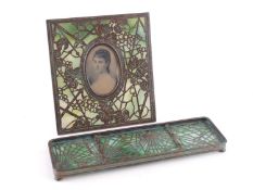 TIFFANY STUDIOS NEW YORK, 'GRAPEVINE' GLASS AND FILIGREE BRONZE EASEL PHOTOGRAPH FRAME, 17cm x 15.