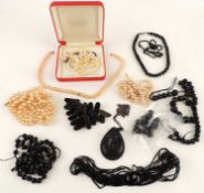 ASSORTMENT OF VICTORIAN JET BEADED JEWELLERY including a carved jet portrait pendant, simulated
