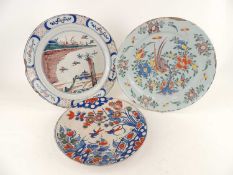 BRISTOL DELFT PLATE, early 18th Century, decorated with birds in a chinoiserie landscape, 31.5cm (