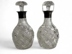 PAIR OF SILVER MOUNTED CUT GLASS MALLET DECANTERS, by Mappin & Webb, London 1929, 26cm (h)