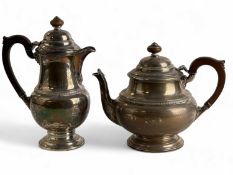 GEORGE V SILVER TEAPOT & HOT WATER JUG, circular form, wooden handles and finials, George Suckling