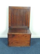 OAK SETTLE, with panelled back, box seat with hinged cover, loose pad cushion, 107 (h) x 65 (w) x