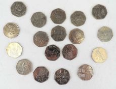 EIGHTEEN RARER 50p COINS, including Beatrix Potter and Charles III Provenance: private collection
