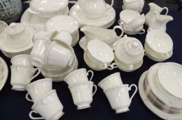 ROYAL DOULTON CARNATION PATTERN CHINA TEA AND DINNER SERVICES (84 pieces) Provenance: private