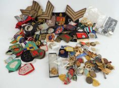 ASSORTMENT OF MILITARY AND OTHER CLOTH BADGES including medal ribbons, Aden military service badges,
