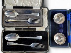 GEORGE V SILVER CHRISTENING SETS, each comprising spoon and fork, including George Unite, Birmingham