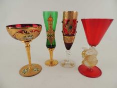 MURANO GILDED RUBY GLASS GOBLET, also THREE GILDED VENETIAN GLASSES (4) Provenance: private