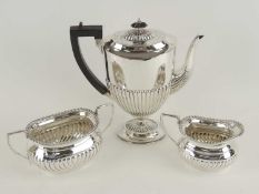 VICTORIAN SILVER PEDESTAL COFFEE POT, by Charles Boyton & Son, London 1894, with ebony handle and