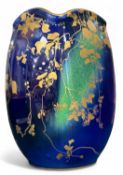 ROYAL DOULTON TITANIAN VASE, shape no. 7992, with blue-green ground detailed with gilt leaves,