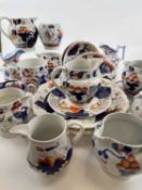 VARIOUS 19TH CENTURY GAUDY WELSH TABLEWARE, including jugs, cup and saucers, and side plates