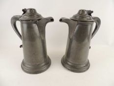 PAIR OF VICTORIAN PEWTER ECCLESIASTICAL FLAGONS, late 19th Century, 33cm (h) Provenance: The John