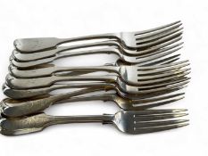 ELEVEN VICTORIAN SILVER FIDDLE PATTERN TABLE FORKS, by George Adams, London 1871, 831g Provenance: