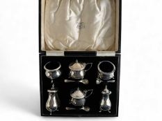 LATE VICTORIAN SILVER SIX-PIECE CONDIMENT, Levi & Salaman, Birmingham 1919, comprising two lidded