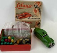 SCHUCO 3000 TELESTEERING CAR, boxed, with coloured wooden bollards, steering wheel, cable, and key