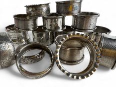 COLLECTION OF FIFTEEN SILVER NAPKIN RINGS, various hallmarks, 264g gross Provenance: private