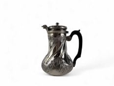 FRENCH SILVER HOT WATER JUG, late 19th Century, wrythen baluster form with ebony handle, 17cm (h),