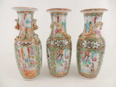 PAIR OF CANTON FAMILLE ROSE VASES, late 19th/early 20th Century, 25cm (h), also a similar CANTON