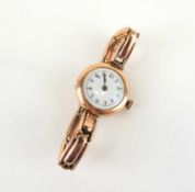 VINTAGE 9CT GOLD LADY'S BRACELET WRISTWATCH, on a 9ct gold expandable bracelet, 24g gross. Comments: