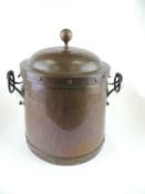 ARTS AND CRAFTS HAMMERED COPPER LIDDED COAL BIN, circa 1900, with wrought steel handles, 43cm (h)
