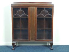GEORGE V MAHOGANY DISPLAY CABINET on claw and ball feet, 125 (h) x 110 (w) x 29cms (d) Provenance:
