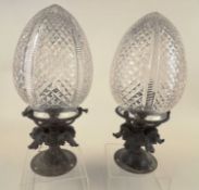 PAIR OF EDWARDIAN POST LAMPS with metal bases and diamond cut glass pineapple shades, 26cms (h)