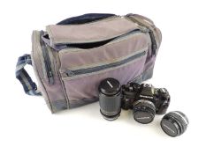 OLYMPUS OM40 CAMERA OUTFIT including a Miranda 70-210mm zoom lens and other accessories, contained