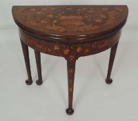 DUTCH MAHOGANY AND MARQUETRY INLAID FOLDING GAMES TABLE, late 18th Century, 75.5 (h) x 83.5 (w) x