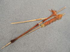 TWO AFRICAN SPEARS & A BOW (3) Provenance: private collection Gwynedd