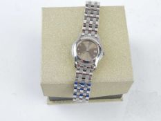 GUCCI STAINLESS STEEL LADIES BRACELET WRISTWATCH, model 5500L, brushed steel dial with diamond
