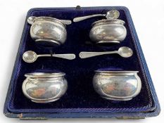 SET OF FOUR SILVER SALTS, maker JG, Birmingham 1906, together with four associated silver salt