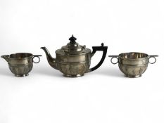 EDWARD VII THREE-PIECE SILVER TEA SERVICE, of circular form, with applied bands of decoration, sugar