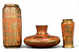 THREE ROYAL DOULTON ORANGE LUSTROUS VASES, each decorated with stylised banded decoration with a