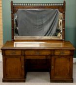 AESTHETIC MOVEMENT WALNUT SIDEBOARD, late 19th century, the mirror back having spindle gallery top