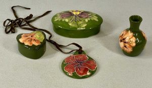 MOORCROFT OVAL COLUMBINE LIDDED BOX, 13 x 9cms; and a hibiscus lidded heart-shaped box, 7cms; posy