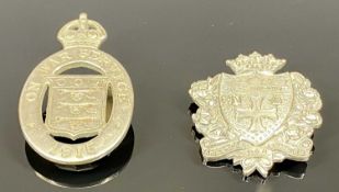 1915 NICKEL BADGE 'ON WAR SERVICE', by Thomas Fattorini, Bolton; and a silver-plated shield badge '