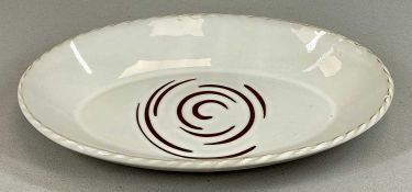 STEPHEN PEARCE, CORK OVAL STUDIO POTTERY DISH, white glazed with blue swirled pattern and crimped