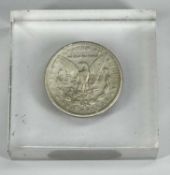 1883 AMERICAN SILVER DOLLAR, encased in Perspex Provenance: private collection Flintshire