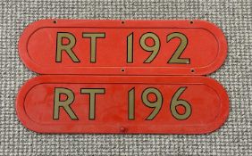 TWO REPRODUCTION ROUTEMASTER BONNET FLEET NUMBER PLATES, RT196 and RT192, red with gold lettering