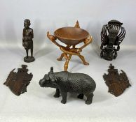 BALINESE HARDWOOD CARVING OF GARUDA, 27cms (h); two Balinese hardwood masks, 33.5cms; native