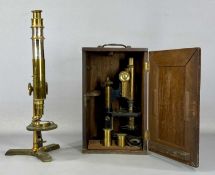 W. WATSON & SONS LTD. LACQUERED BRASS CASED MICROSCOPE, in mahogany case with accessories, including