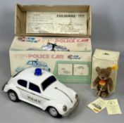 A NEW SIREN JAPANESE TINPLATE BATTERY OPERATED VW POLICE CAR, Non-fall Mystery Bump 'n Go, and a