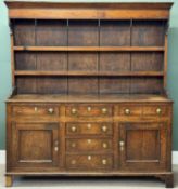 GEORGE III OAK WELSH DRESSER, boarded plate rack back having two shelves, base having three top
