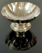 STYLISH WHITE METAL BOWL with scalloped sides, on raised circular foot, possibly American, Reed &