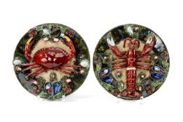PAIR OF CALDAS PALISSY WARE POTTERY DISHES decorated in relief with crab and a lobster and various