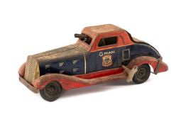 AMERICAN LOUIS MARX TINPLATE CLOCKWORK 'G-MAN' PURSUIT CAR, c. 1630s, the driver with tommy gun