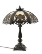 BRADLEY & HUBBARD-STYLE TABLE LAMP, slag glass shade with metal frame and column, 56cms (h)