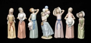 SEVEN LLADRÓ FIGURINES including, Curious Girl with Straw Hat 5009, Girl with Straw Hat 5008,
